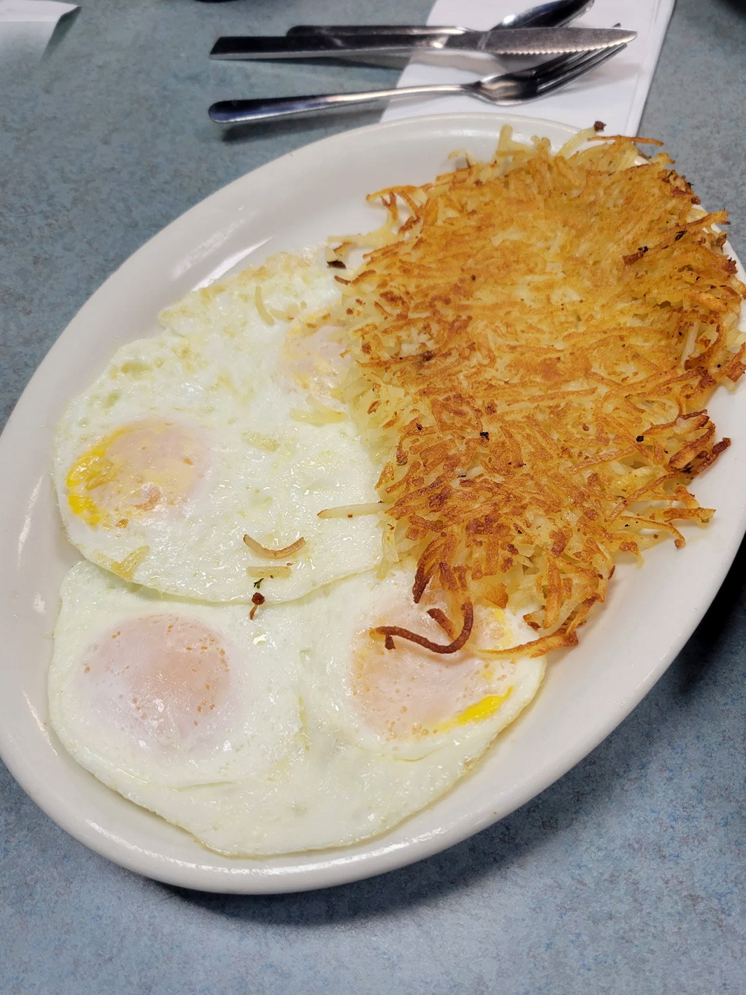 Breakfast classics — eggs & hash browns at Golden Bear Restaurant in Largo, Florida